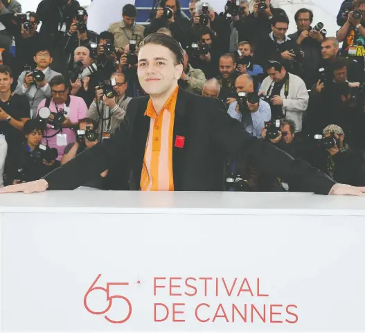  ?? PASCAL LE SEGRETAIN/GETTY IMAGES FILES ?? Xavier Dolan, pictured in 2012, has premièred all but one of his eight films at Cannes, where he has become part of the contempora­ry lore.