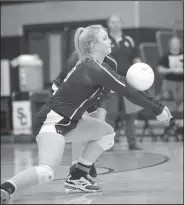  ?? NWA Democrat-Gazette/ANDY SHUPE ?? Shiloh Christian’s Anna Grace Smith digs a ball against Rogers on Tuesday.