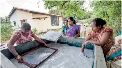  ??  ?? Making paper: Women working together at the Ranapuram centre