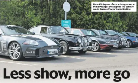  ??  ?? Up to 100 Jaguars of every vintage meet at Pease Pottage Services prior to a country run to Denbies Vineyard near Dorking.