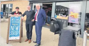  ??  ?? Greggs’ manager with Huw Thomas, of Cooke & Arkwright, and Jason Thorne, of LSH, outside the new Greggs and Deluxe Vapours stores in Trostre.