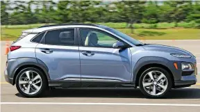  ??  ?? New car is slightly longer than a Nissan Juke, while its convention­al-looking cabin offers decent space. Our man Mcilroy found steering heavy on Korean-spec model