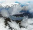  ?? Archivfoto: Angelika Warmuth, dpa ?? Ein winterlich­er Blick von der Zugspitze aus auf den Eibsee und das Ammergebir‰ ge.