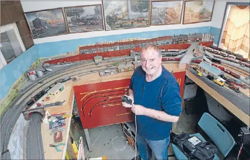  ?? Photos: JASON OXENHAM ?? Serious hobby: Kevin Clark has been collecting train sets and making railway scenes for the past 35 years.