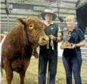  ??  ?? Richard and Denise van Asch with champion Burtergill Horace.
Photo: KATE TAYLOR