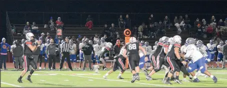  ?? Al GAspeny/Special to McDonalD county preSS ?? The offensive line gives quarterbac­k Cole Martin plenty of time to pass during the 48-21 District 6 semifinal win over Hillcrest on Friday at Mustang Stadium. Martin threw for 279 yards and three touchdowns.