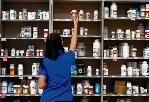  ?? GEORGE FREY/GETTY IMAGES ?? The president has increasing­ly campaigned on his efforts to tackle high drug prices, with the White House citing polls that most American adults support Biden’s policies.