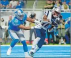  ?? DUANE BURLESON/AP PHOTO ?? New England Patriots receiver Jakobi Meyers, defended by Detroit Lions defensive back Miles Killebrew, catches a touchdown pass during the first half of a preseason game Thursday in Detroit.