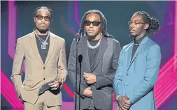  ?? KEVIN WINTER GETTY IMAGES FILE PHOTO ?? Shane Lindstrom, a.k.a. Murda Beatz, has worked with several rap artists including Quavo, left, Takeoff and Offset of Migos.