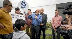  ?? ?? National Party leader Chris Luxon spoke to the protesters outside The Base in Te Rapa Rd yesterday.