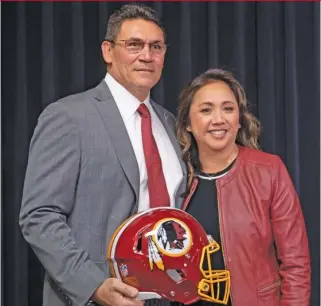  ?? AP ?? The Redskins’ Ron Rivera (with wife Stephanie) is only the fourth minority head coach in the NFL.