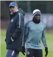  ??  ?? Maurizio Sarri, left, and N’Golo Kante during training yesterday