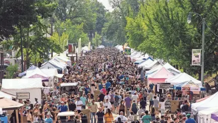  ?? ZIGGY MACK ?? Attendees wade through the crowd at the 34th annual Cooper-young Festival Sunday in Memphis.