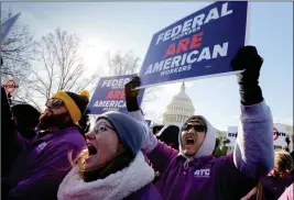  ?? ASSOCIATED PRESS ?? ON THE 20TH DAY OF A PARTIAL GOVERNMENT SHUTDOWN, federal employees rally at the Capitol in Washington on Thursday too protest the impasse between Congress and President Donald Trump over his demand to fund a U.S.-Mexico border wall.
