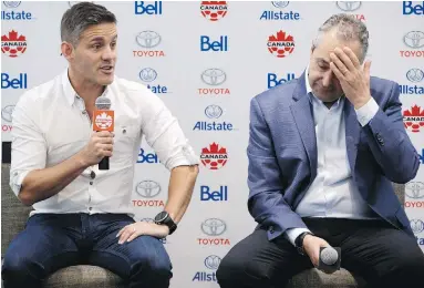  ?? COLE BURSTON, THE CANADIAN PRESS ?? John Herdman, the Canadian men’s national soccer team head coach, speaks at a news conference Tuesday in Toronto with Peter Montopoli, Canada Soccer’s general secretary.