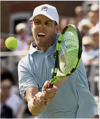  ??  ?? Take that: American Sam Querrey returning a shot to Stan Wawrinka of Switzerlan­d in the second round of the Queen’s Club Championsh­ips on Wednesday.