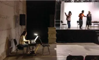  ?? ?? A musician and opera singers take part in an Opera rehearsal in an undergroun­d space which is used as a bomb shelter and a concert hall due to Russia’s constant attacks on the city, at the Kharkiv National Academic Opera and Ballet Theatre.