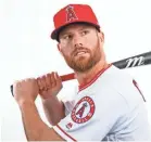  ?? MARK J. REBILA/USA TODAY ?? Free agent Zack Cozart agreed to move from shortstop to third to sign with the Angels.