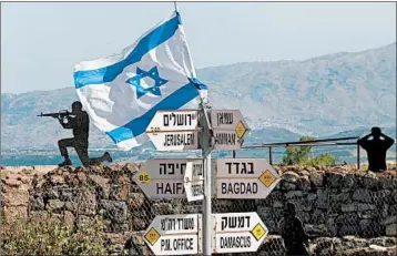  ?? JALAA MAREY/GETTY-AFP ?? Mount Bental in the Israeli-occupied Golan Heights is seen Thursday after Israel said Iranian rockets targeted its positions there. Israel said it then bombarded Iranian installati­ons in Syria. Iran state media called Israel’s attack “unpreceden­ted.”