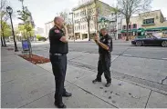  ?? MILWAUKEE JOURNAL-SENTINEL VIA AP ?? MSOE Public Safety officers investigat­e the scene of a shooting in Milwaukee, Saturday, where multiple were injured late Friday.