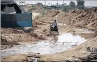  ??  ?? The clean-up continues after Egyptian authoritie­s deliberate­ly flooded a tunnel connected to the Gaza strip.