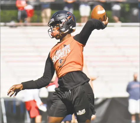  ?? Gregory Vasil / For Hearst Connecticu­t Media ?? Stamford quarterbac­k Isaiah Johnson delivers a pass during the 11th Annual Grip It and Rip It competitio­n on Saturday at New Canaan High School.