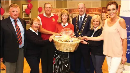  ??  ?? 1st Place prize winners are presented with prizes at the Homeless Aid event in the Baltray Golf Club. Pictured are Olive Morgan, Vice Captain Pat McCabe, Helen Donohue, Mayor Pio Smith, Susan Carroll and Maureen Ward of the Homeless Aid.