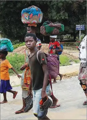  ?? PIC: REUTERS ?? Suffering in silence: Cabo Delgado villagers return home