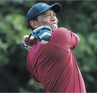  ?? GETTY IMAGES FILE PHOTO ?? Tiger Woods, pictured, contended at a major for the first time since his spinal fusion surgery during the PGA Championsh­ip last weekend, finishing two shots behind the victorious Brooks Koepka.