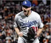  ?? WALLY SKALIJ / LOS ANGELES TIMES ?? Dodgers pitcher Max Scherzer reacts after striking out Wilmer Flores to end Game 5 of the National League Division Series against the Giants on Thursday and putting L.A. into the NLCS.