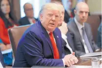  ?? PABLO MARTINEZ MONSIVAIS/ASSOCIATED PRESS ?? President Donald Trump speaks during a Cabinet meeting in the Cabinet Room of the White House on Monday. On Tuesday he called the impeachmen­t hearing “a lynching.”