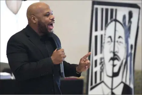  ?? ERIC BONZAR—THE MORNING JOURNAL ?? The Starts Within Organizati­on CEO Carlos Christian serves as keynote speaker of Lorain County Community College’s Dr. Martin Luther King Jr. celebratio­n, Jan. 17. The celebratio­n of King’s life, held in the College Center Commons, focused on...