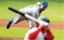  ?? SCOTT HALLERAN/GETTY IMAGES ?? Retired Cy Young winner R.A. Dickey was encouraged to take up the knucklebal­l after his career path had stalled.