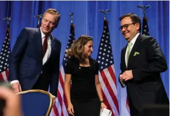  ?? XINHUA/TNS FILE PHOTO ?? U.S. Ambassador Robert Lighthizer, Canada’s Minister of Foreign Affairs Chrystia Freeland and Mexico’s Secretary of Economy Ildefonso Guajardo Villarrea at the first round of NAFTA negotiatio­ns in August.