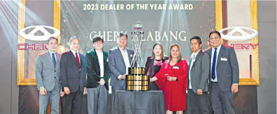  ?? ?? PRESENT during the awards night are (from left) Kenneth Sytin, UAAGI vice chairman; Rommel Sytin, UAAGI chairman; William Chiongbian, FAMC dealer principal; Andrew Solon, Chery Alabang general manager; Claudine Joven, FAMC AVP-Finance; Evelyn Pilapil, FAMC VP Corporate Service; Carlos Soriano, Chery GMA branch manager; and Froilan Dytianquin, Chery Auto Philippine­s managing director.