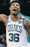  ?? MICHAEL DWYER/AP ?? Marcus Smart has helped set the tone for a Boston Celtics team that has outworked the Cleveland Cavaliers.