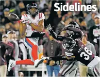  ??  ?? Mississipp­i wide receiver DaMarkus Lodge, left, has a pass knocked away from him by Mississipp­i State defenders, including Johnathan Abram, right, Friday in Starkville, Miss. Mississipp­i won in an upset, beating No. 16 Mississipp­i State 31-28.