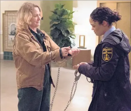  ?? Richard Hutchings IFC Films ?? MELISSA LEO is a prisoner with a few days’ leave and Tessa Thompson plays the correction­s officer escorting her in “Furlough.”