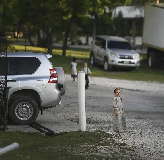  ?? AP ?? ‘WORKING AROUND THE CLOCK’: A child stands on the grounds of the Christian Aid Ministries headquarte­rs in Titanyen, Haiti, on Thursday.