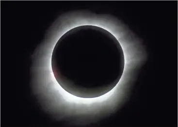 ?? File / The Associated Press ?? A solar eclipse on Monday is set to star in several special broadcasts on TV and online. PBS, ABC, NBC, NASA Television and the Science Channel are planning extended coverage of the first solar eclipse visible across the United States in 99 years.