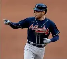  ??  ?? In US baseball, Cleveland, left, will drop the ‘‘Indians’’ from their name after this season but the Atlanta Braves intend to keep their name and tomahawk.