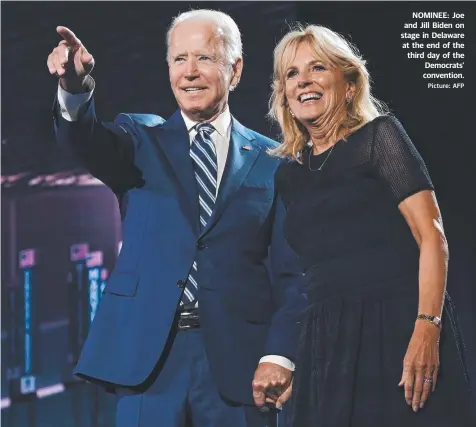  ??  ?? NOMINEE: Joe and Jill Biden on stage in Delaware at the end of the third day of the Democrats’ convention. Picture: AFP