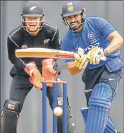 ?? KUNAL PATIL / HT PHOTOS ?? Board President’s XI batsman Karun Nair topscored for his side with 78; (left) Trent Boult, who took five 38, feels the heat at Brabourne Stadium on Tuesday.