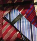  ?? JOSHUA BRIGHT/THE NEW YORK TIMES ?? Ties for sale, for $60 each, at the Trump Store in Trump Tower in New York.