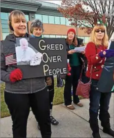  ?? DIGITAL FIRST MEDIA FILE PHOTO ?? Protests like this one against the GOP tax overhaul will continue outside the Springfiel­d office of U.S. Rep. Patrick Meehan.