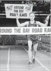  ?? HAMILTON SPECTATOR FILE PHOTO ?? Reid Coolsaet crossing the finish line at the Around the Bay Road Race in 2012. Coolsaet said it would “be cool running in the dark” in Doha.