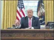  ?? EVAN VUCCI — THE ASSOCIATED PRESS ?? President Donald Trump points to the door as reporters are escorted out of a meeting with with Senate Majority Leader Mitch McConnell of Ky., and House Minority Leader Kevin McCarthy of Calif., in the Oval Office of the White House, Monday, July 20.