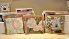  ??  ?? Notecards by painter Ginger Alexander who specialize­s in oil, watercolor and acrylics.