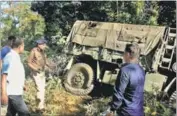  ?? PTI ?? Assam police DGP Mukesh Sahay inspects the spot where three jawans were killed in Tinsukia district of Assam on Saturday.