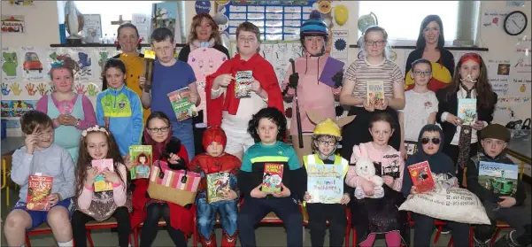  ??  ?? Boys and girls with teachers, Emer Stone and Hilary Johnson and principal Deirdre Ryan at World Book Day at Castledock­rell National School.